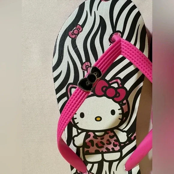 Sanrio Hello Kitty flip flops zebra print with bow detail - Picture 4 of 5